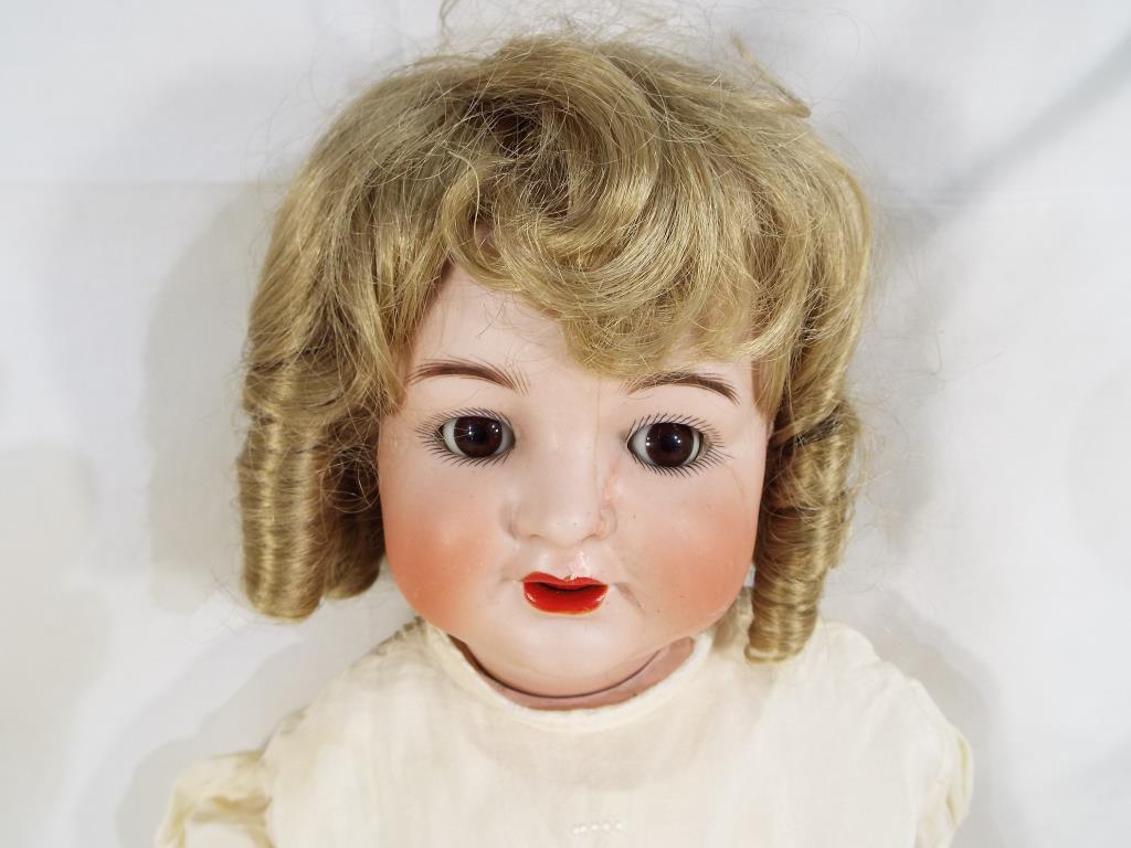 Kammer & Reinhardt - a bisque headed dressed doll by Kammer & Reinhardt with sleeping glass eyes, - Image 2 of 6