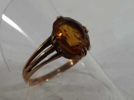 A lady's stone set ring marked 9ct, size P. approximately 2.3 g (all in).