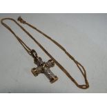A lady's 9 carat gold chain with 9 carat gold stone set cross stamped 375, approximate weight 3.