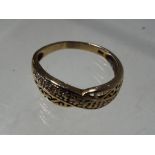 A lady's 9 carat gold stone set ring with scrolling plaited decoration, stamped 375,