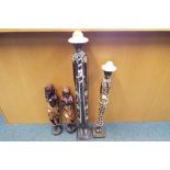 Four hand carved wooden figures the largest being approx 105cm (h)
