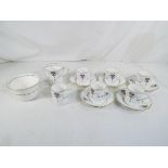 Shelley - a Shelley coffee set with floral decoration comprising five saucers, six coffee cans,