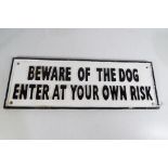 A cast iron sign Beware of the Dog,