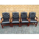Four good quality black leather boardroom armchairs [4]