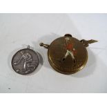 A Crown Green Bowls measure and a rare silver Bowls medal.
