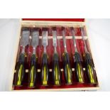 A wooden cased set of deluxe seven piece chisel set Est £20 - £30