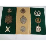 Nine regimental badges, Argyles, HLI, Royal Scots, Gordon Highlanders, Scottish Kings Borderers,