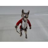 A silver fox wearing a red hunting jacket Est £45 - £60