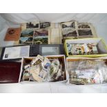 A good mixed lot of collectables to include first day covers, three boxes of tea cards,