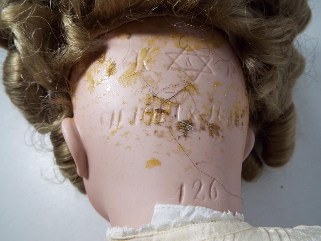 Kammer & Reinhardt - a bisque headed dressed doll by Kammer & Reinhardt with sleeping glass eyes, - Image 5 of 6