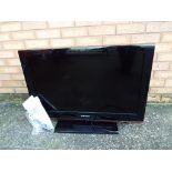 A Samsung 31inch flat screen television, model #LE32B530P7W with power lead,