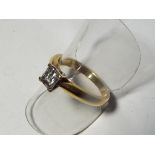 A lady's 18 carat gold diamond solitaire ring, .