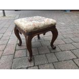 A Victorian mahogany stool, having cabriole legs and C-scroll decoration, ca 1860,