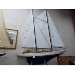 A very large twin masted pond yacht of wooden construction approximately 175 cm [h] including masts,
