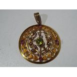 A lady's 9 ct gold stone set pendant, approximate weight 4.29g , overall diameter of pendant 3.
