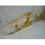 A large unusual wooden carved fish with gilded highlights,