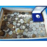 A quantity of UK and Worldwide coins to include a small collection of silver,
