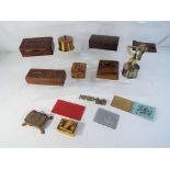 A quantity of postal related collectables to include wooden stampboxes, two metal cased stamp rolls,