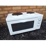 A Russell Hobbs mini Oven - Grill approx 32cm x 58cm x 36cm appears unused