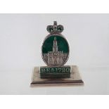 An early twentieth century silver and enamel menu / table place card holder,