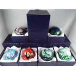 A lot comprising six boxed glass paperweights Est £20 - £30