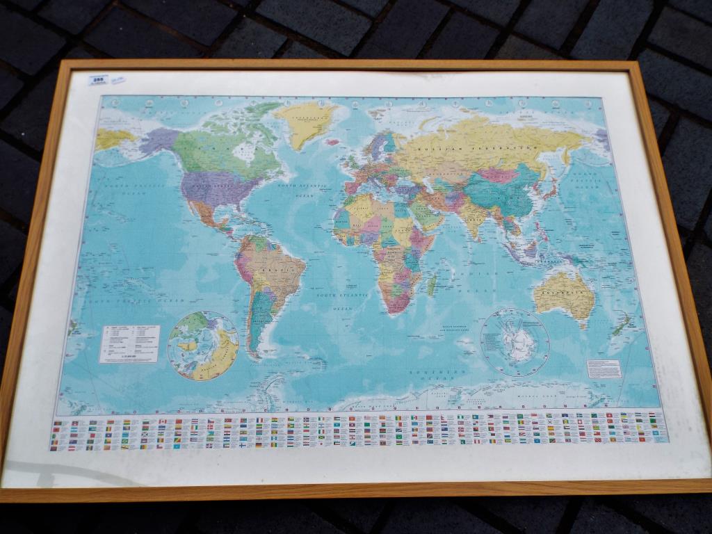 A modern framed print of a map mounted and framed overall size including frame 73cm x 103cm