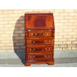 A good quality mahogany writing bureau with four drawers below,