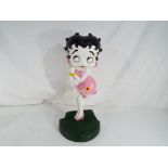 A cast iron Betty Boop door stop approximate height 36 cm Est £20 - £40.