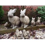 Seven stoneware garden ornaments, squirrels, rabbits, etc,