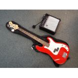 Gear 4 Music - a bass guitar by Gear 4 Music (red) with shoulder strap, jack lead,