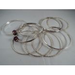 A lot containing ten silver bangles Est £45 - £60