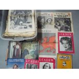 A large quantity of vintage newspapers and magazines from 1930's to 1950's to include The Daily
