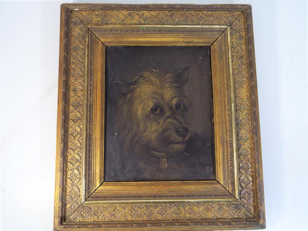 An oil on canvas portrait from mid to late -19th century depicting a Scottish terrier, signed W.C.