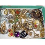 A good mixed lot to include a quantity of brooches, paired earrings,