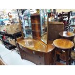 A walnut veneered glass topped dressing table with over mirror opening to reveal a small shelving