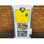 Football - a Brazil signed football shirt with two signed photographs,