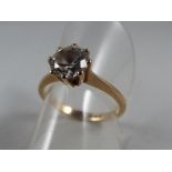 A 9ct gold solitaire ring with cz, size O, approx weight 2.
