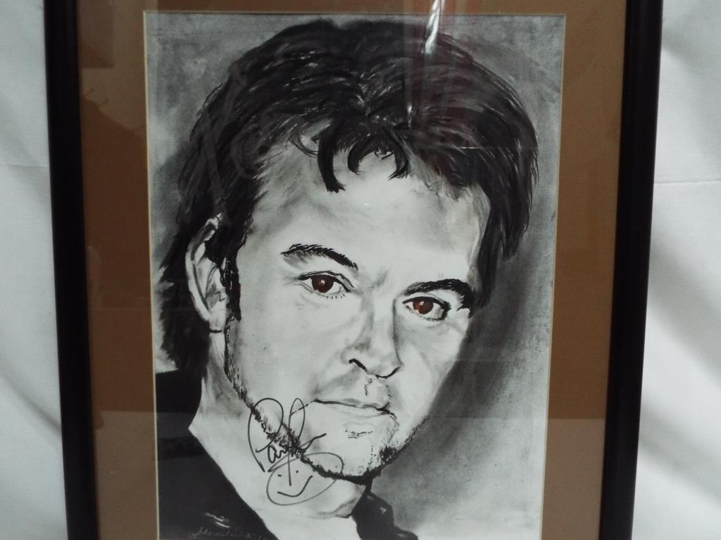 A charcoal on paper drawing of Paul Young by Madelaina Murthwaite mounted and framed under glass, - Image 3 of 3
