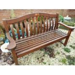 A good quality three-seater teak garden bench seat of classic design - Est £50 - £80