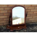 A good quality mahogany dressing-table mirror with scroll feet,