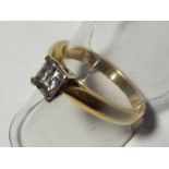 A lady's 18 carat gold diamond solitaire ring, .