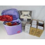 Unused Retail Stock - an Along Came Betty bag containing a quantity of retail cosmetic items,