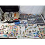 Philately - a lot to include a quantity of mint stamps, three albums,