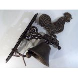 A bronze effect cast wall hanging iron bell with cockerell decoration Est £15 - £25