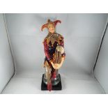 A Royal Doulton figure entitled The Jester HN1702, approximate height 26 cm.