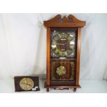 A President wall clock with pendulum and a Metamec mantle clock [2].