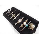 Seven vintage bar brooches and one further stone set brooch with centre pearl,