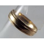 A 9 carat yellow gold band stamped .375, approx weight 2.