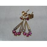 A pair of 9ct gold earrings, stone set,