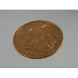 A Victorian half sovereign dated 1897, approximate weight 3.95 g, Est £100 - £150.